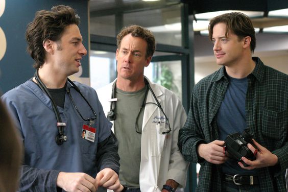 SCRUBS -- "My Screw Up" Episode 14 -- Pictured: (l-r) Zach Braff as Dr. John 'J.D.' Dorian, John C. McGinley as Dr. Perry Cox, Brendan Fraser as Ben Sullivan -- (Photo by: Carin Baer/NBCU Photo Bank/NBCUniversal via Getty Images via Getty Images)