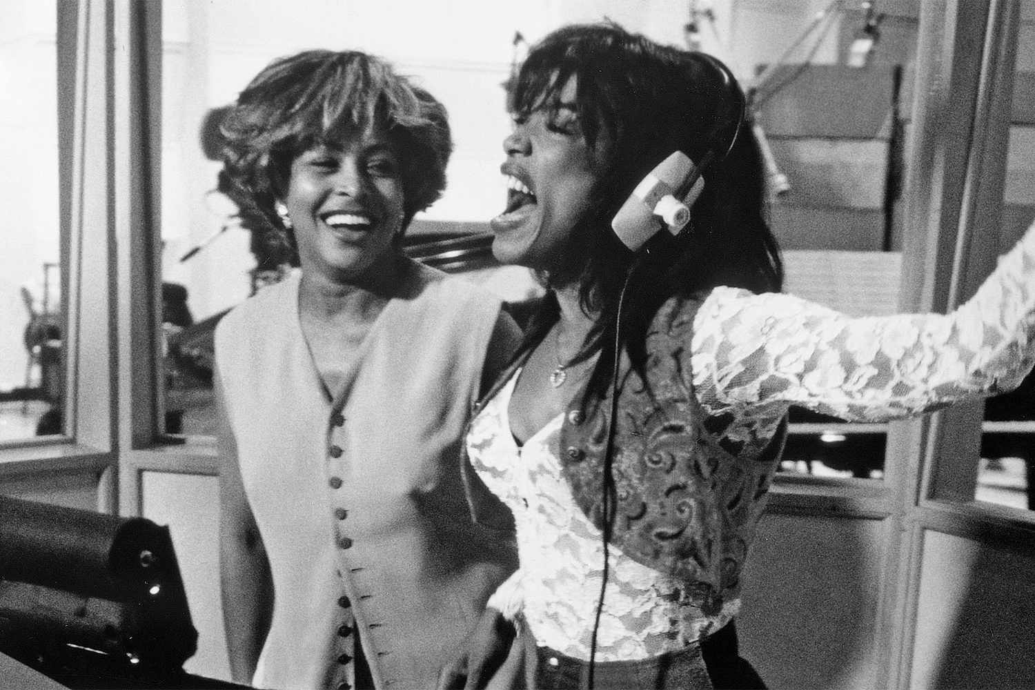 WHAT'S LOVE GOT TO DO WITH IT, from left: Tina Turner, Angela Bassett on the recording studio set, rehearse a song performance, 1993. ph: D Stevens / Â© Buena Vista Pictures / courtesy Everett Collection