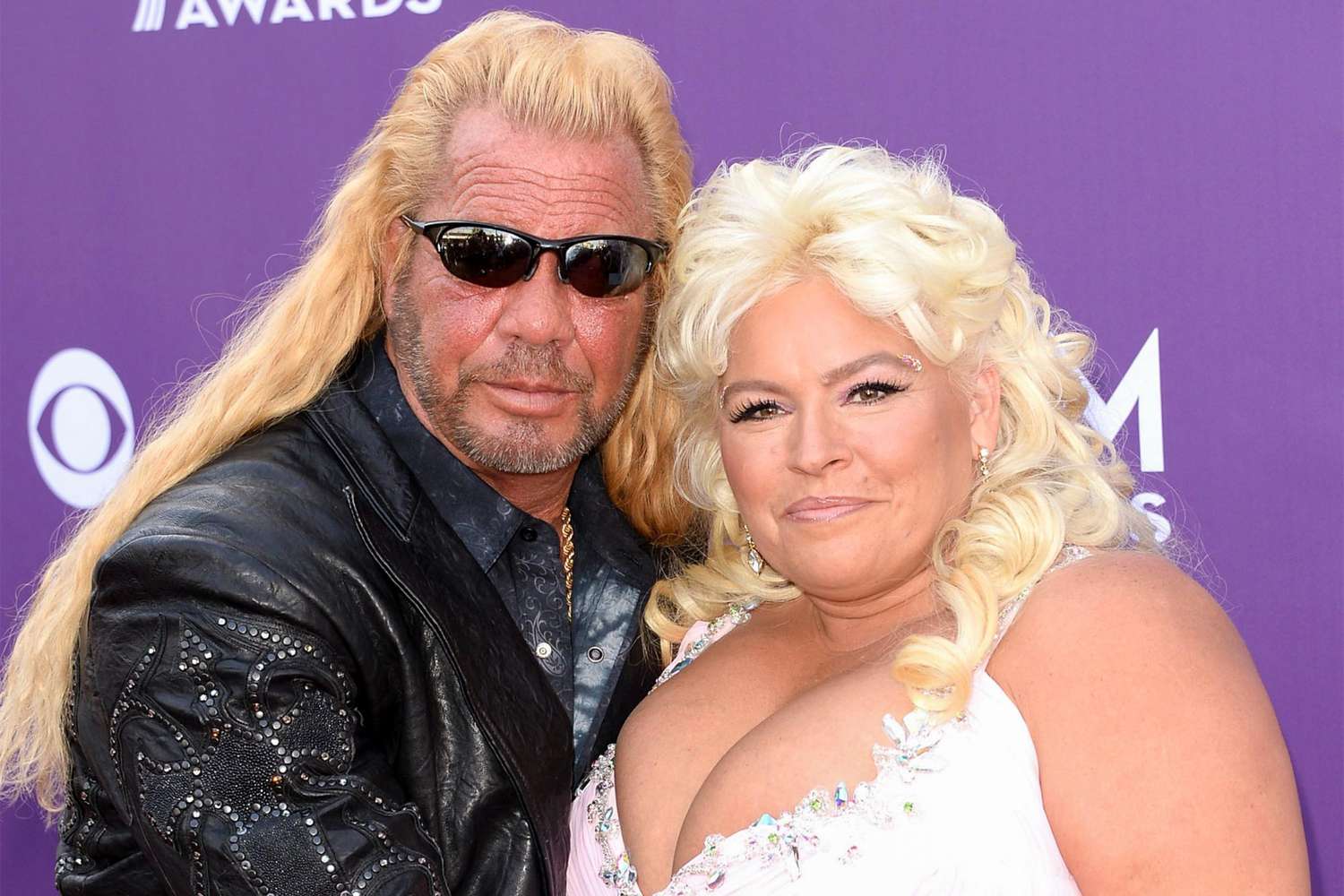 LAS VEGAS, NV - APRIL 07: TV personalities Dog the Bounty Hunter (L) and Beth Chapman arrive at the 48th Annual Academy of Country Music Awards at the MGM Grand Garden Arena on April 7, 2013 in Las Vegas, Nevada. (Photo by Jason Merritt/Getty Images)