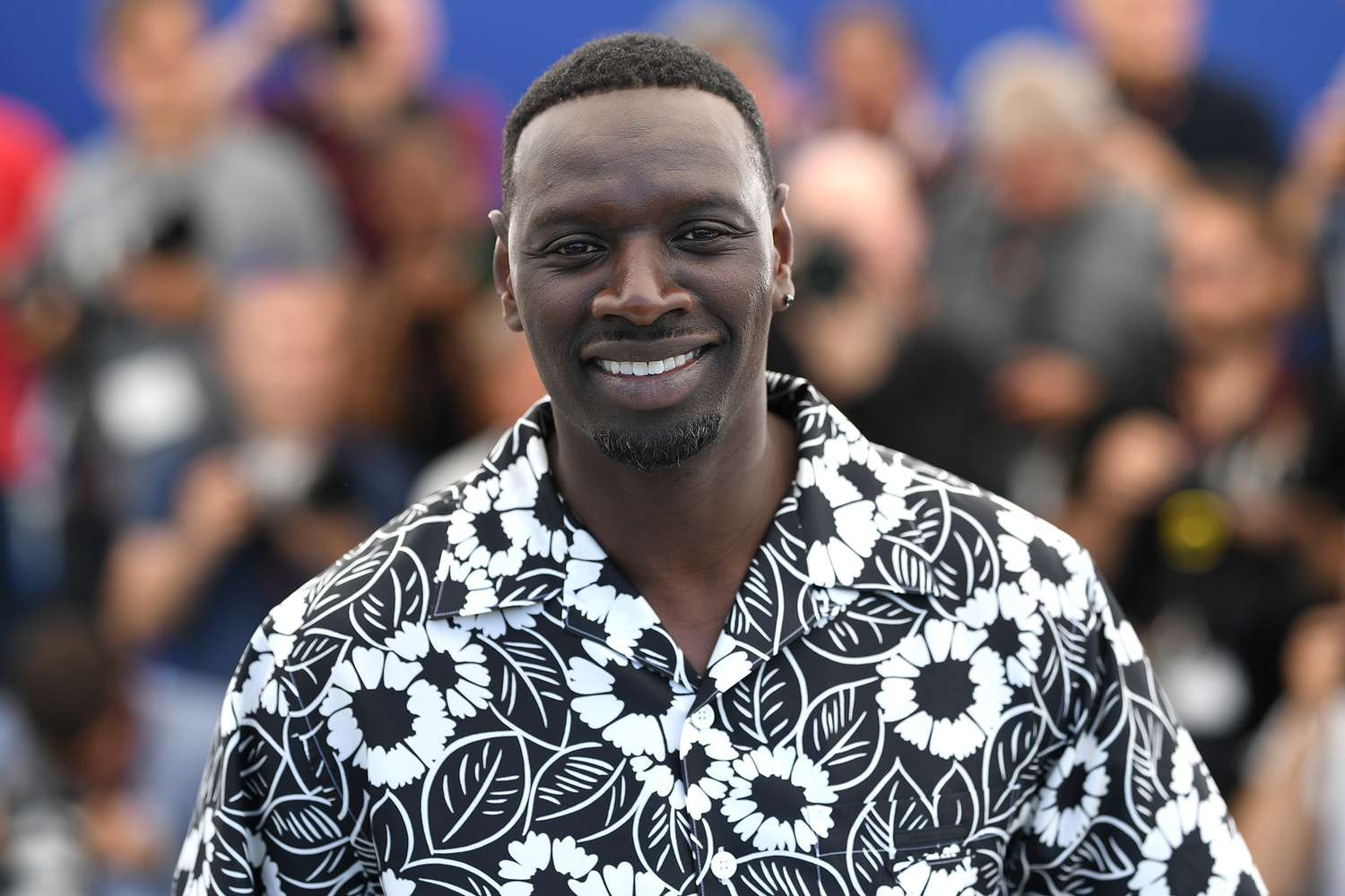 Omar Sy attends the photocall for "Tirailleurs" (Father And Soldier) during the 75th annual Cannes film festival at Palais des Festivals on May 19, 2022 in Cannes, France.