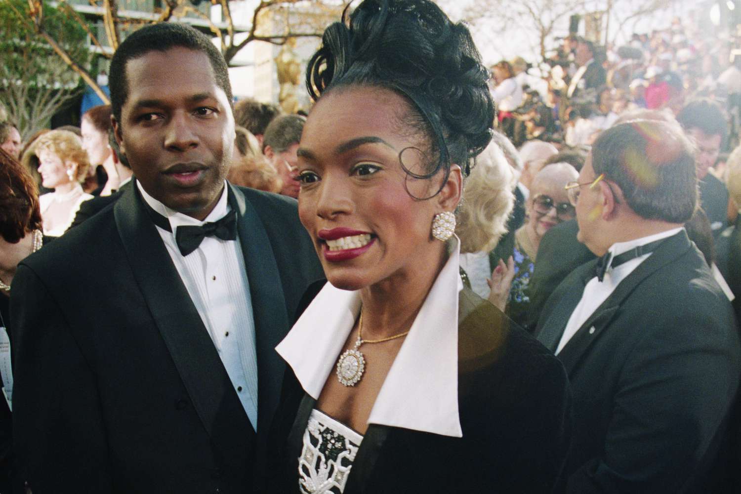Angela Bassett and Courtney B. Vance arrive at the 1994 Academy Awards Ceremony. Bassett was nominated for the Best Actress award for her role as Tina Turner in the 1993 film, What's Love Got to Do with It.