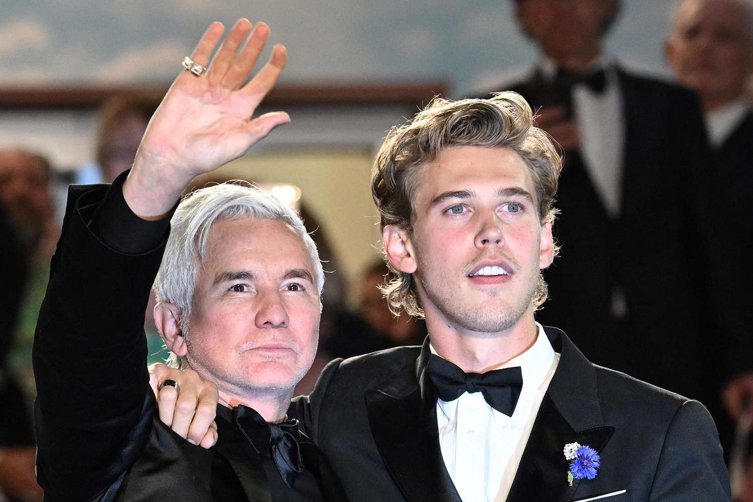 Baz Luhrmann (L) and US actor Austin Butler pose as they leave the Festival Palace following the screening of the film "Elvis" during the 75th edition of the Cannes Film Festival in Cannes, southern France, on May 25, 2022.