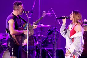 Chris Martin of Coldplay and Melanie C perform onstage during the 8th annual "We Can Survive" concert hosted by Audacy at Hollywood Bowl on October 23, 2021 in Los Angeles, California.