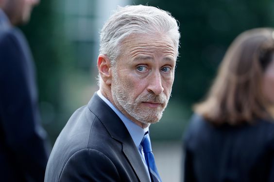 Comedian and activist Jon Stewart stands on the North Lawn of the White House in between media interviews after he attended the signing ceremony for the PACT Act on August 10, 2022 in Washington, DC. 