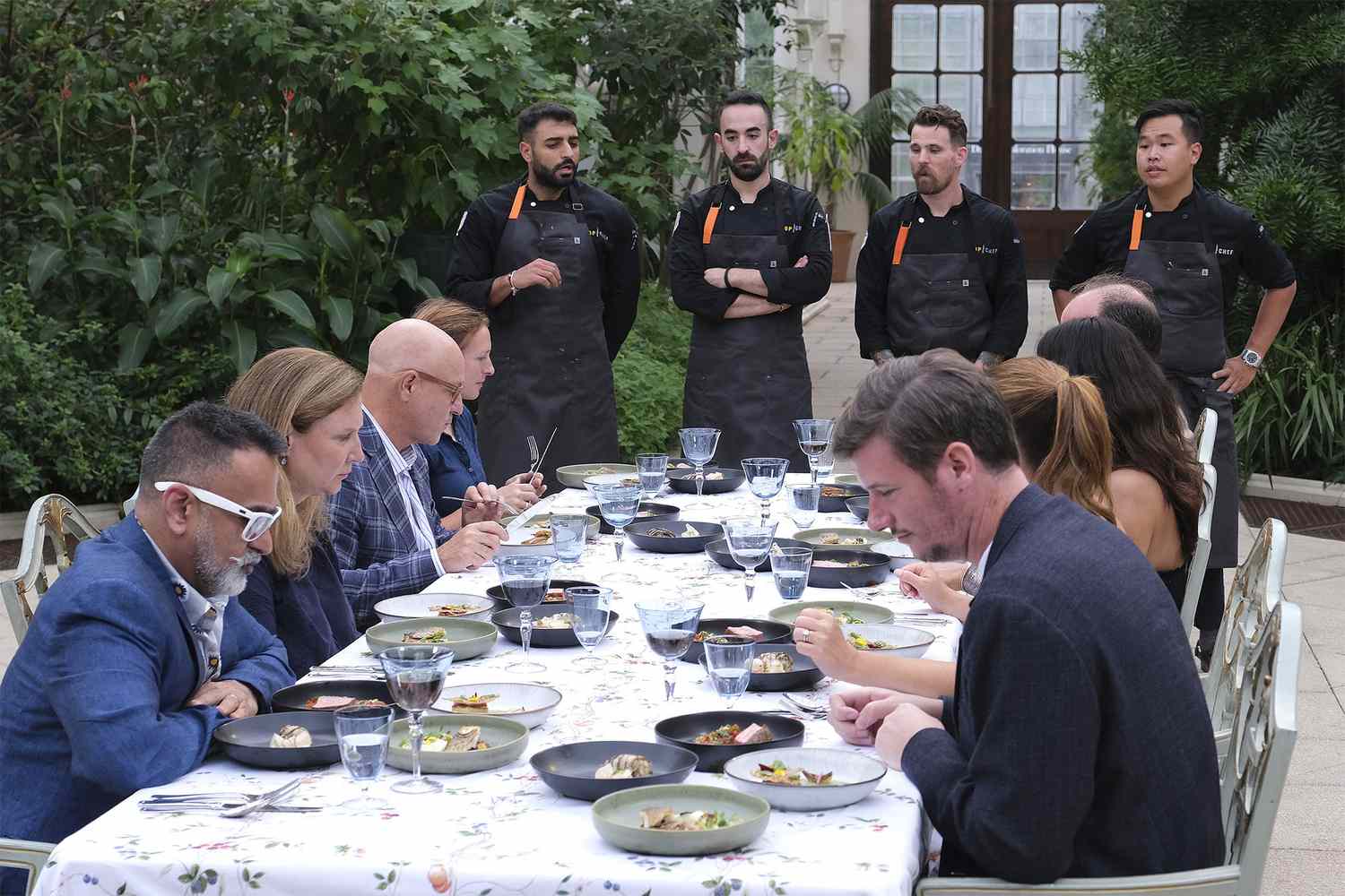 TOP CHEF -- Episode 2001 -- Pictured: (l-r) Angela Harnett, Tom Colicchio, Ali Al Ghzawi, Charbel Hayek, Dale MacKay, Buddha Lo -- (Photo by: David Moir/Bravo)