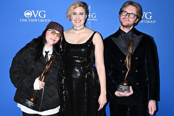 Billie Eilish, winner of the Chairman's Award, Greta Gerwig and FINNEAS, winner of the Chairman's Award, pose in the press room at the 2024 Palm Springs International Film Festival Film Awards held at the Palm Springs Convention Center on January 4, 2024 