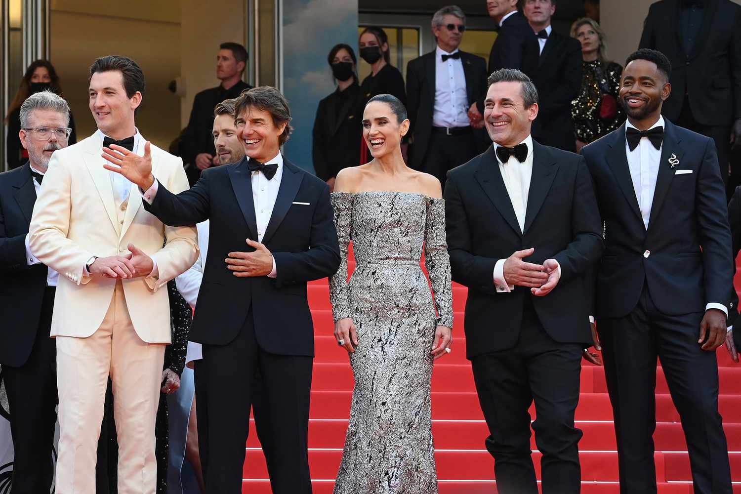 Christopher McQuarrie, Miles Teller, Glen Powell, Tom Cruise, Jennifer Connelly, Jon Hamm and Jay Ellis attend the screening of "Top Gun: Maverick" during the 75th annual Cannes film festival at Palais des Festivals on May 18, 2022 in Cannes, France.
