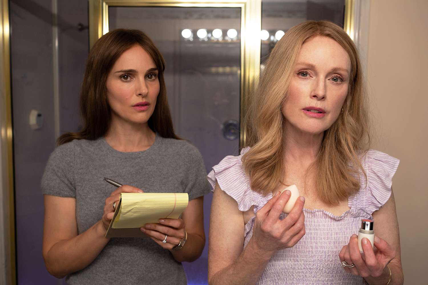 May December. (L to R) Natalie Portman as Elizabeth Berry and Julianne Moore as Gracie Atherton-Yoo in May December.