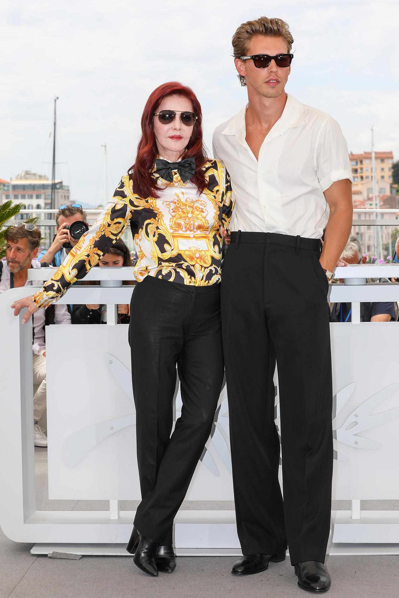 Priscilla Presley and Austin Butler attend the photocall for "Elvis" during the 75th annual Cannes film festival at Palais des Festivals on May 26, 2022 in Cannes, France.