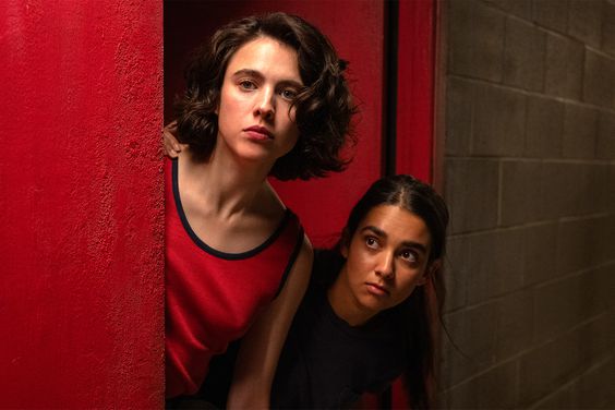 (L to R) Margaret Qualley as "Jamie" and Geraldine Viswanathan as "Marian" in director Ethan Coen's DRIVE-AWAY DOLLS