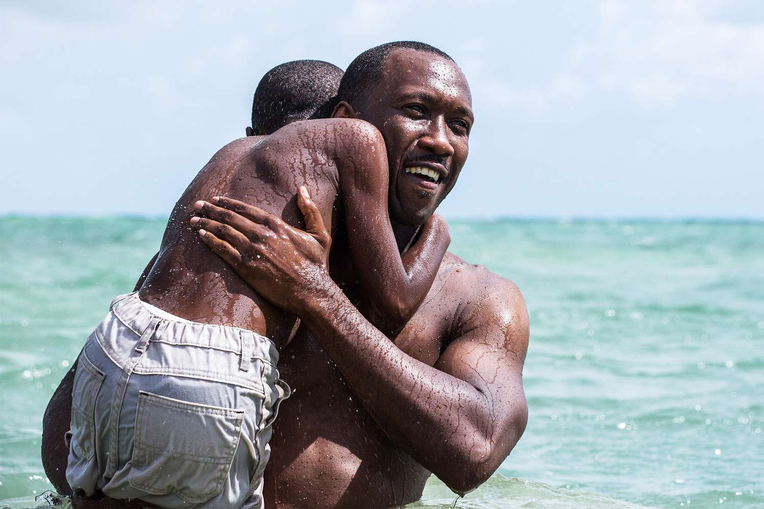 MOONLIGHT, from left: Alex R. Hibbert, Mahershala Ali, 2016. ph: David Bornfriend/ © A24 /courtesy Everett Collection