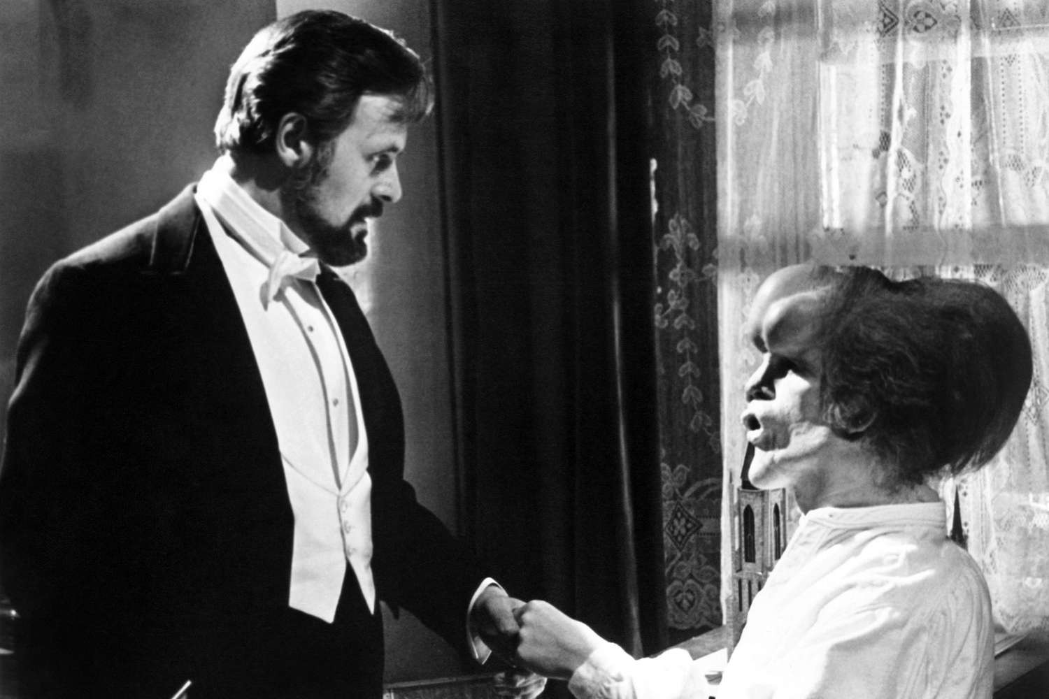 THE ELEPHANT MAN, from left: Anthony Hopkins, John Hurt, 1980