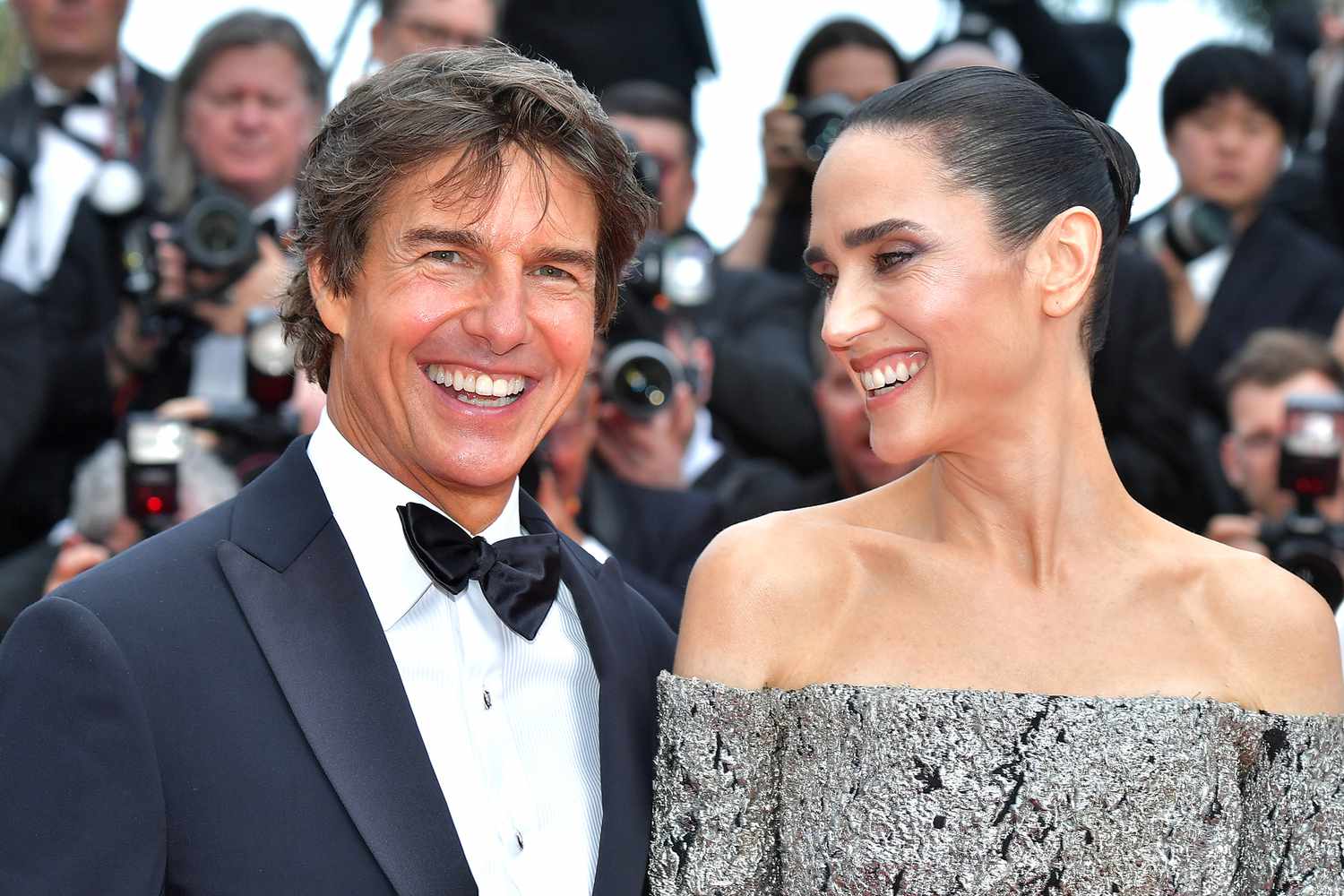 Jennifer Connelly and Tom Cruise attend the screening of "Top Gun: Maverick" during the 75th annual Cannes film festival at Palais des Festivals on May 18, 2022 in Cannes, France.