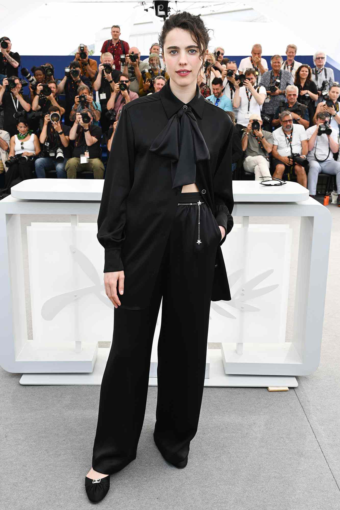 Margaret Qualley attends sthe photocall for "Stars At Noon" during the 75th annual Cannes film festival at Palais des Festivals on May 26, 2022 in Cannes, France.