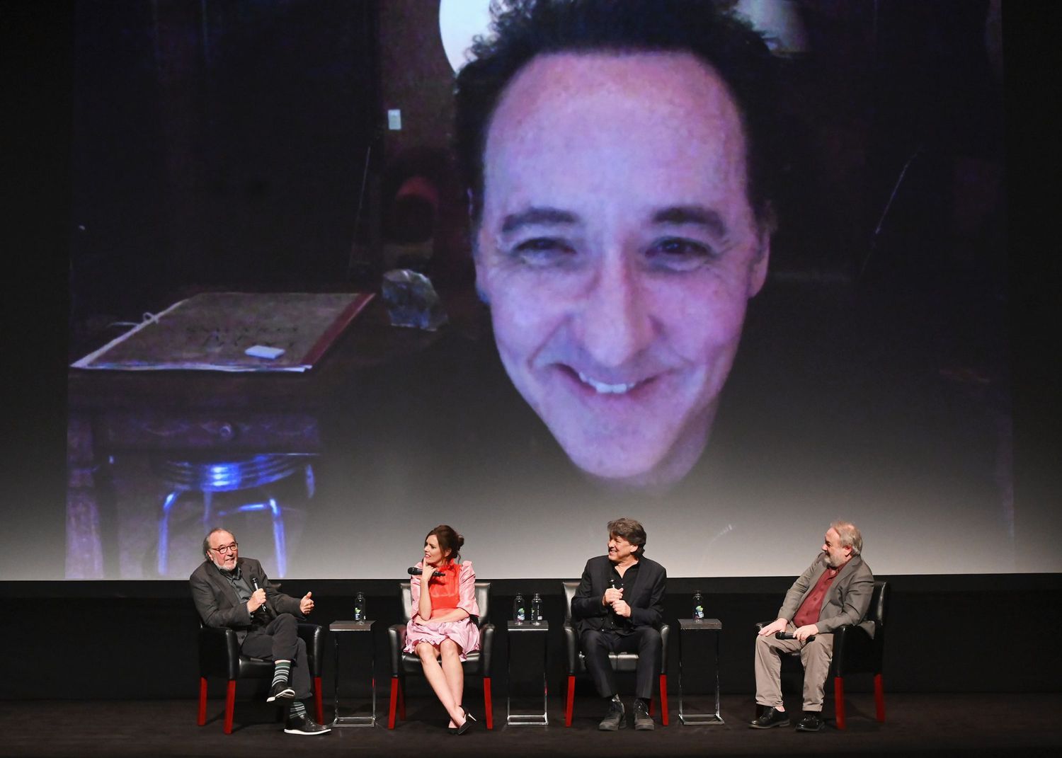NEW YORK, NEW YORK - APRIL 30: A live skype feed with, John Cusack, Executive Producer James L. Brooks, Ione Skye, Director Cameron Crowe and moderator David Edelstein speak at the screening of "Say Anything..." 30th Anniversary - 2019 Tribeca Film Festival at BMCC Tribeca PAC on April 30, 2019 in New York City. (Photo by Nicholas Hunt/Getty Images for Tribeca Film Festival)
