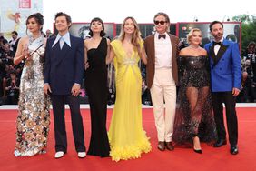 Gemma Chan, Harry Styles, Sydney Chandler, director Olivia Wilde, Chris Pine, Florence Pugh and Nick Kroll attend the "Don't Worry Darling" red carpet at the 79th Venice International Film Festival on September 05, 2022 in Venice, Italy.