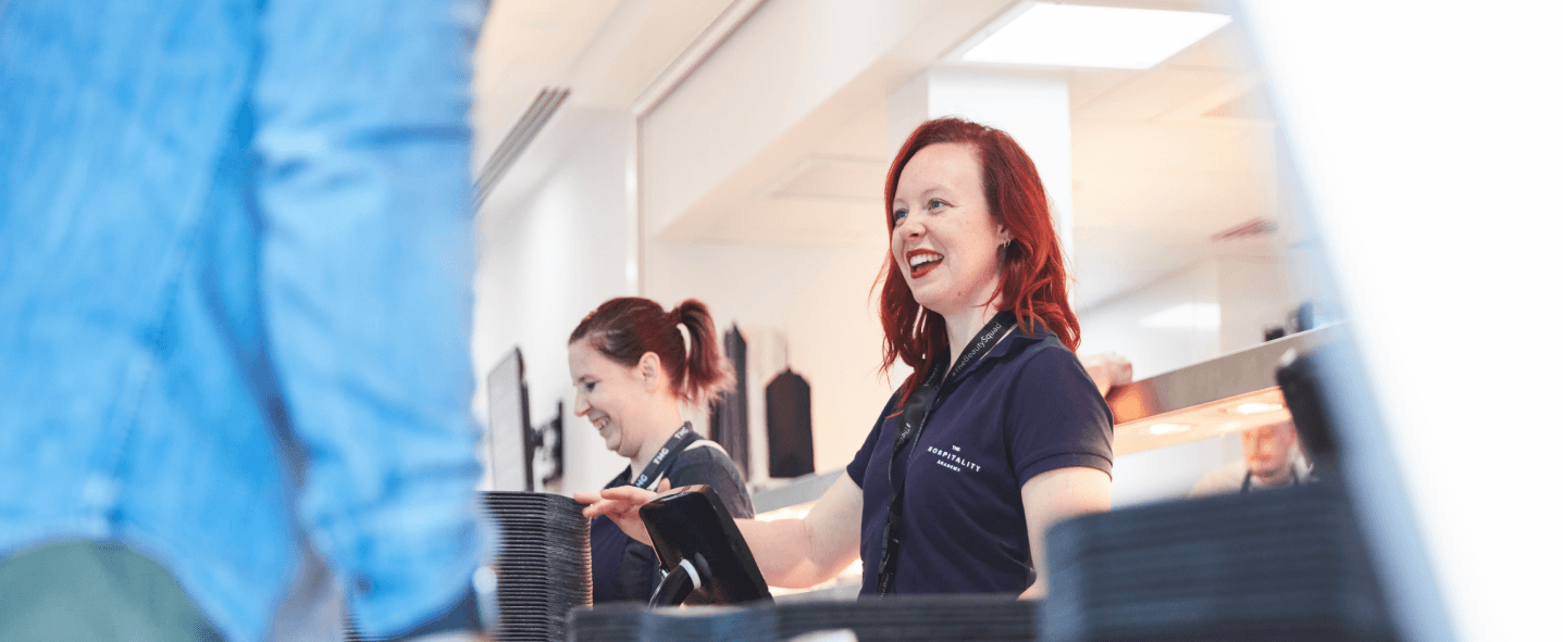 Canteen staff at the company canteen cash register