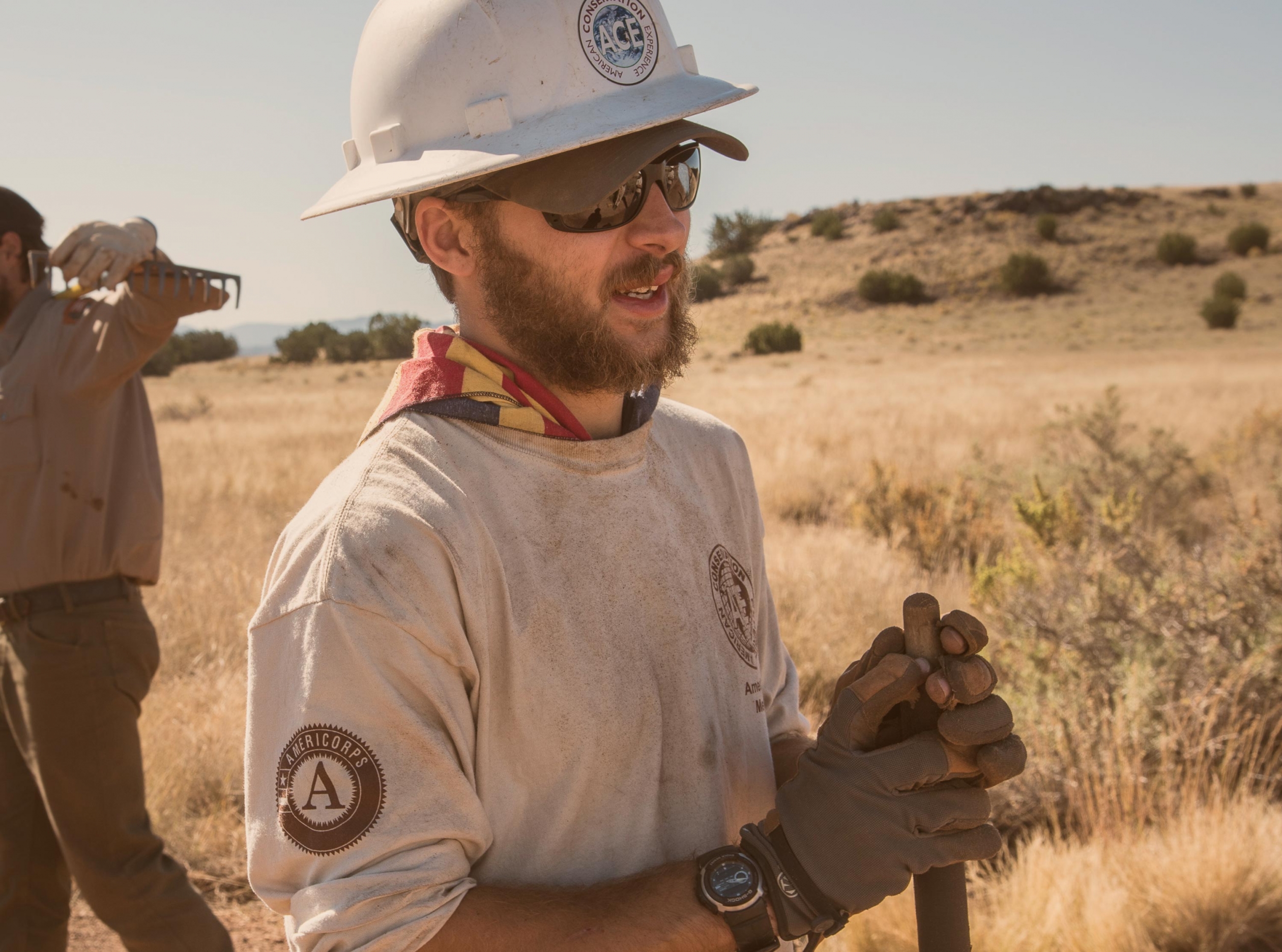 ACE volunteer restoring trail at Wupatki Citadel Ruin