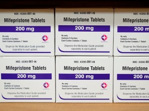 Boxes of the drug mifepristone sit on a shelf