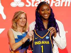 WNBA Commissioner Cathy Engelbert and Aliyah Boston pose for photos after Boston was drafted 1st overall by the Indiana Fever