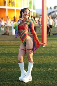 INDIO, CALIFORNIA - APRIL 13: (FOR EDITORIAL USE ONLY) A festivalgoer attends the 2024 Coachella Valley Music and Arts Festival at Empire Polo Club on April 13, 2024 in Indio, California. (Photo by Monica Schipper/Getty Images for Coachella)