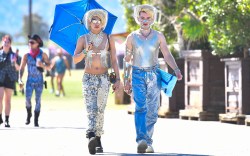 Festivalgoers attend the Coachella Valley Music and Arts Festival in Indio, California, on April 14, 2024.