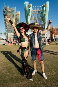 INDIO, CALIFORNIA - APRIL 20: (FOR EDITORIAL USE ONLY) Festival goers attend the 2024 Coachella Valley Music and Arts Festival - Weekend 2 at Empire Polo Club on April 20, 2024 in Indio, California. (Photo by Timothy Norris/Getty Images for Coachella)