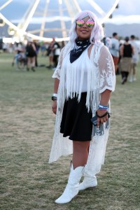 INDIO, CALIFORNIA - APRIL 14: (FOR EDITORIAL USE ONLY) A festivalgoer attends the 2024 Coachella Valley Music and Arts Festival at Empire Polo Club on April 14, 2024 in Indio, California. (Photo by Monica Schipper/Getty Images for Coachella)