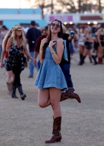 INDIO, CALIFORNIA - APRIL 27: (FOR EDITORIAL USE ONLY) Festivalgoers attend the 2024 Stagecoach Festival at Empire Polo Club on April 27, 2024 in Indio, California. (Photo by Frazer Harrison/Getty Images for Stagecoach)