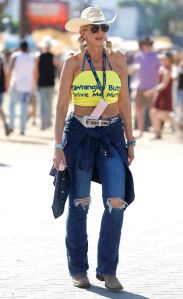 INDIO, CALIFORNIA - APRIL 27: (FOR EDITORIAL USE ONLY) Festivalgoers attend the 2024 Stagecoach Festival at Empire Polo Club on April 27, 2024 in Indio, California. (Photo by Frazer Harrison/Getty Images for Stagecoach)