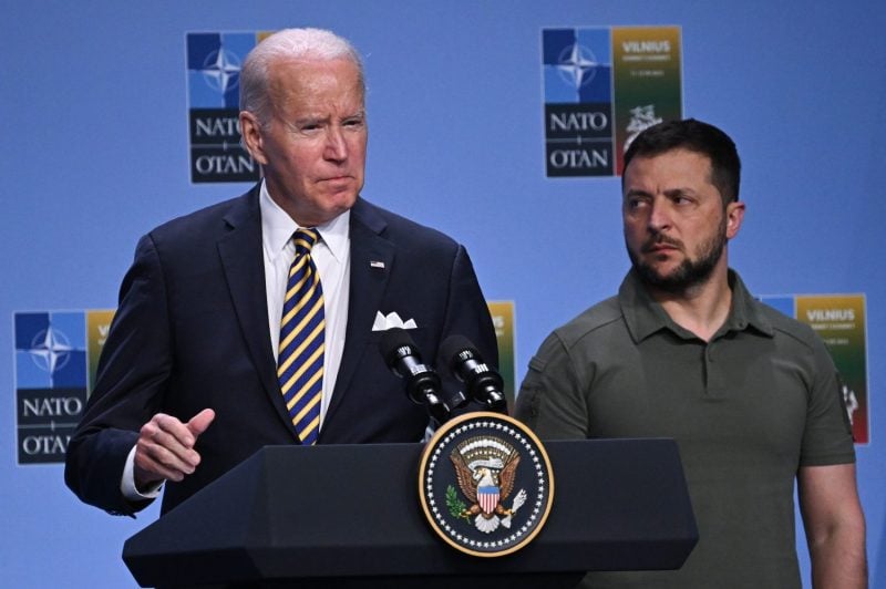 U.S. President Joe Biden speaks alongside Ukrainian President Volodymyr Zelensky at the NATO summit in Vilnius, Lithuania, on July 12, 2023.