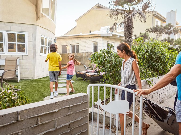 family in house with garden