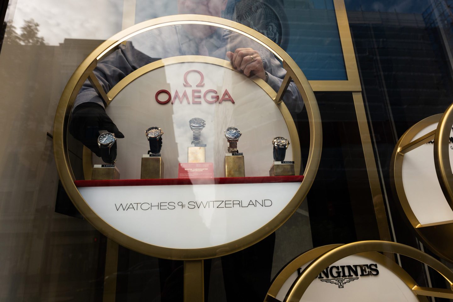 A display of Omega SA watches in the window of a Watches of Switzerland Group Plc store on Regent Street in London, UK, on Wednesday, Aug. 30, 2023. One of Watches of Switzerland Group Plc&#039;s biggest investors cut its stake in the UK-listed timepiece retailer less than 24 hours after Rolex SA decided to buy a rival, Bucherer AG. Photographer: Jose Sarmento Matos/Bloomberg via Getty Images