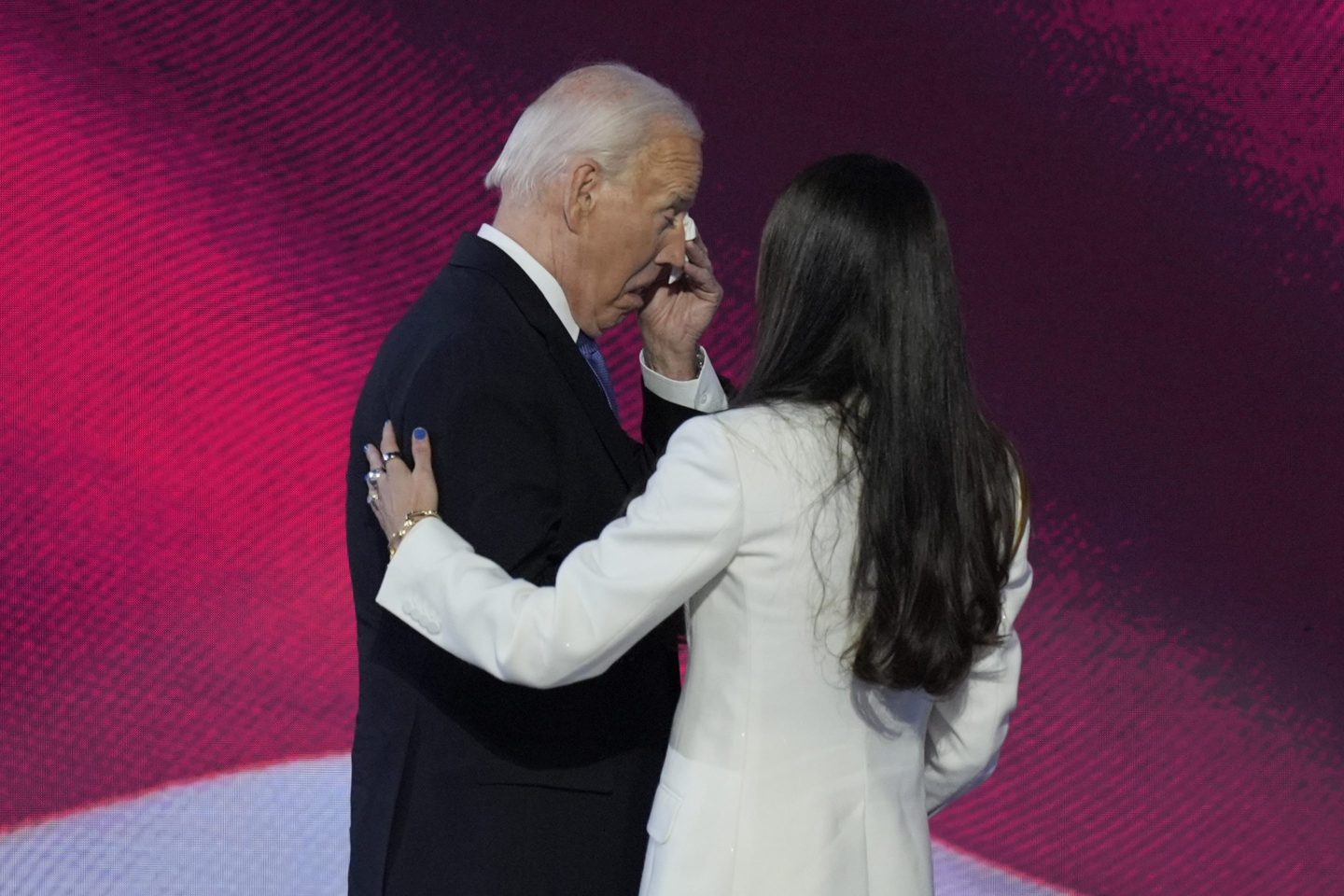 Biden wipes away a tear on stage at the DNC