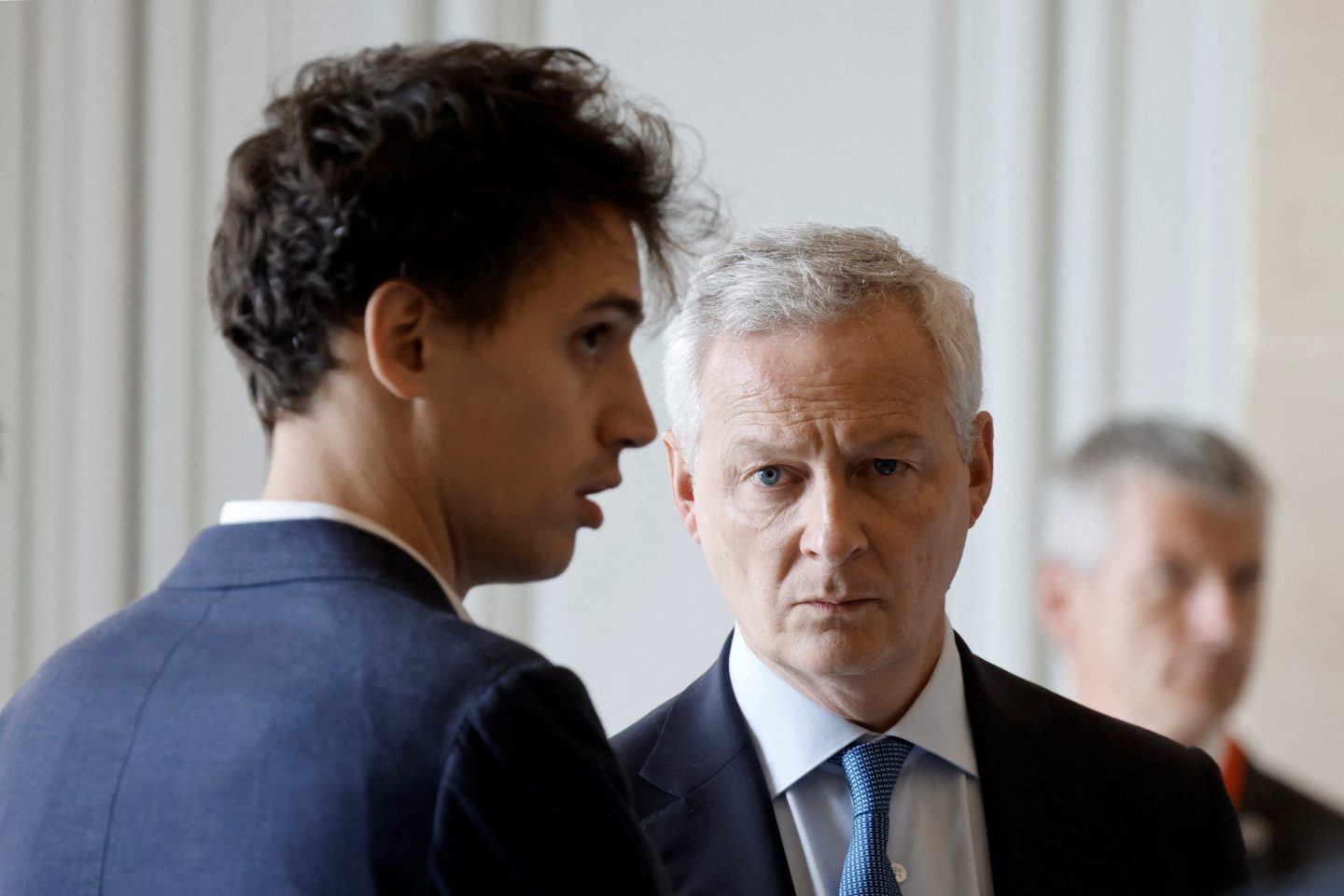 French Economy Minister Bruno Le Maire (R) and founder of the Mistral AI startup Arthur Mensch (L) attend the seventh &#8220;Choose France Summit&#8221;, aiming to attract foreign investors to the country, at the Chateau de Versailles, outside Paris, on May 13, 2024. France has received combined investment commitments from foreign companies of more than 15 billion euros ($16.2 billion), French President&#8217;s office said today. (Photo by Ludovic MARIN / POOL / AFP) (Photo by LUDOVIC MARIN/POOL/AFP via Getty Images)