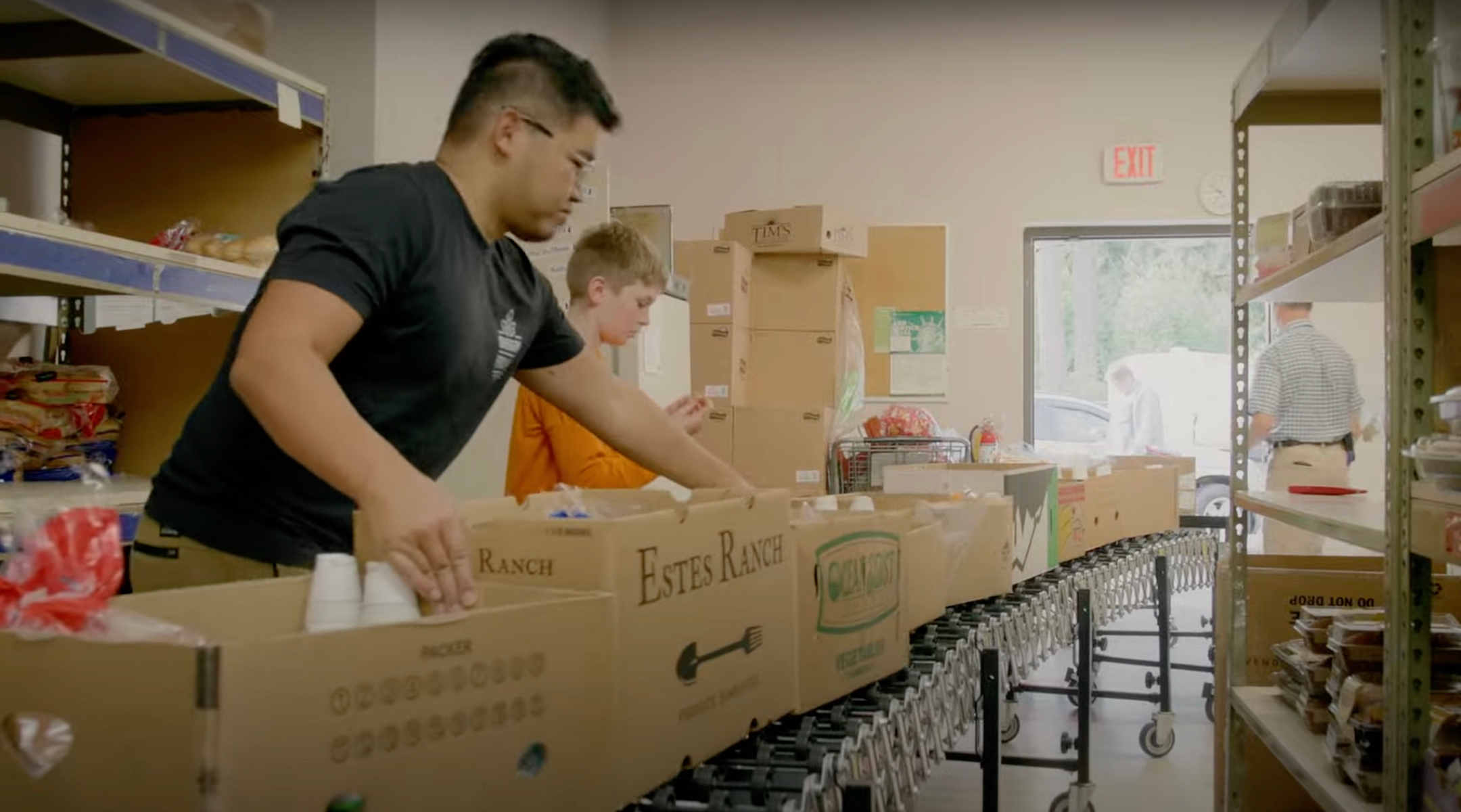 Volunteers at the Oregon Food Bank, 2023. (Screenshot via YouTube)