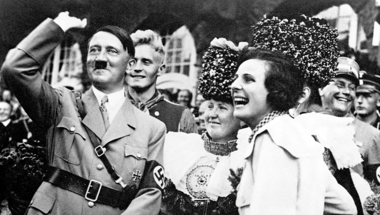 Adolf Hitler with filmmaker Leni Riefenstahl during a Nazi rally in Nuremberg, Germany, 1934. (History/Universal Images Group via Getty Images)