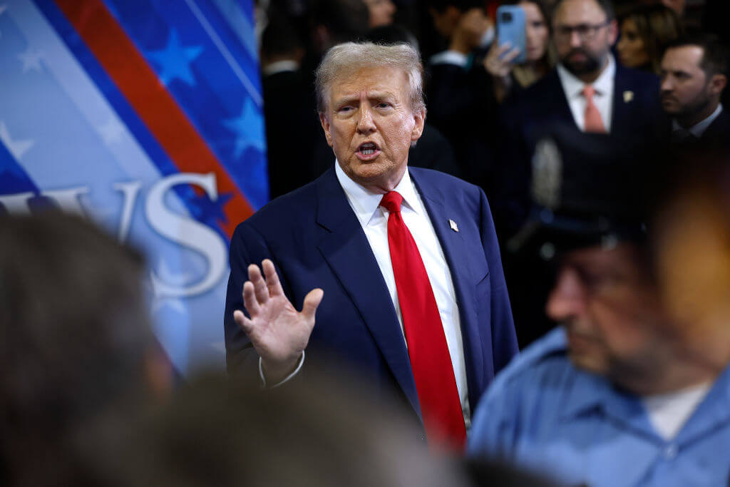 Former President Donald Trump talks to journalists after he debated Vice President Kamala Harris on Sept. 10, 2024 in Philadelphia.