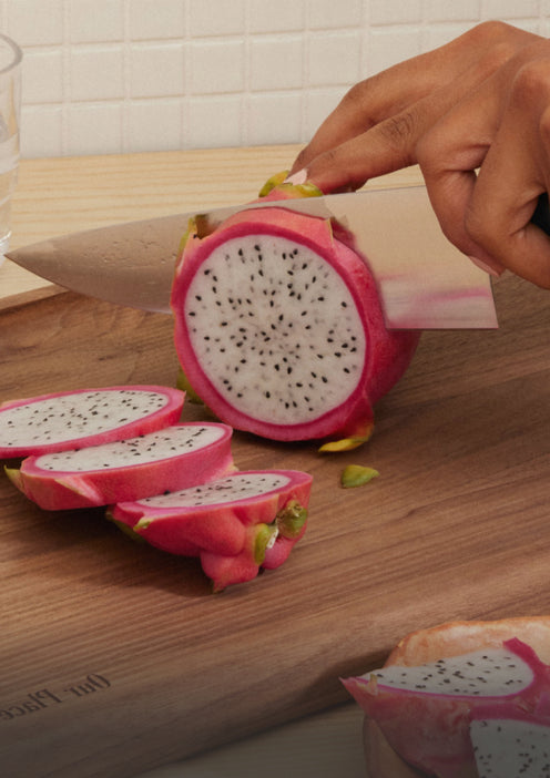 chefs knife cutting dragon fruit