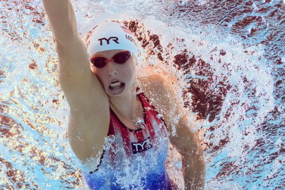 An underwater view shows US' Katie Ledecky competing in a heat of the women's 1500m freestyle swimming event during the Paris 2024 Olympic Games at the Paris La Defense Arena in Nanterre, west of Paris, on July 30, 2024