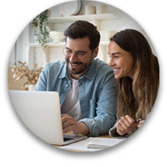 Photo of a couple at a computer