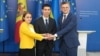 Romanian Foreign Minister Luminita Odobescu (left), Moldovan Foreign Minister Mihai Popsoi (center), and Ukrainian Foreign Minister Dmytro Kuleba in Chisinau on July 5.