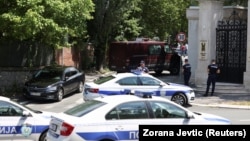 Police secure the area after an attack near the Israeli Embassy in Belgrade on June 29. 