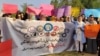 Afghan women on June 10 protest against the Taliban's upcoming participation in a UN conference in Doha. 