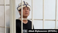 Askat Jetigen attends a court hearing at the Sverdlov court in Bishkek on June 24.