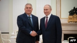 Hungarian Prime Minister Viktor Orban (left) meets with Russian President Vladimir Putin at the Kremlin in Moscow, in a handout picture released by Orban's office on July 5.