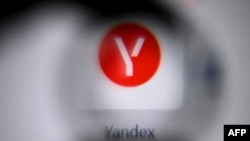 Yandex's logo on a laptop screen
