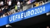 Supporters arrive prior to the UEFA Euro 2024 Group C soccer match between Serbia and England at the arena in Gelsenkirchen on June 16.