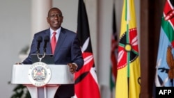 FILE - Kenya's President William Ruto speaks at the State House in Nairobi, July 11, 2024, the day he dismissed most of his cabinet after weeks of protests prompted by proposed tax hikes and transformed into calls for Ruto to remove allegedly corrupt and non-performing ministers.