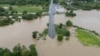 La Plata river floods after Tropical Storm Ernesto hit Toa Baja, Puerto Rico, Aug. 14, 2024. In later days, swells generated by Ernesto affected portions of Bermuda and the U.S. and Canadian east coasts. The storm was expected to pass near southeastern Newfoundland late Monday.